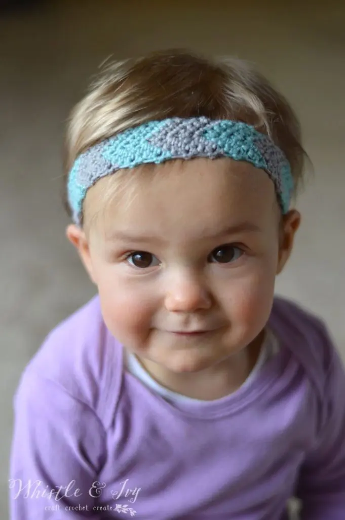 image of baby with turquoise crochet headband