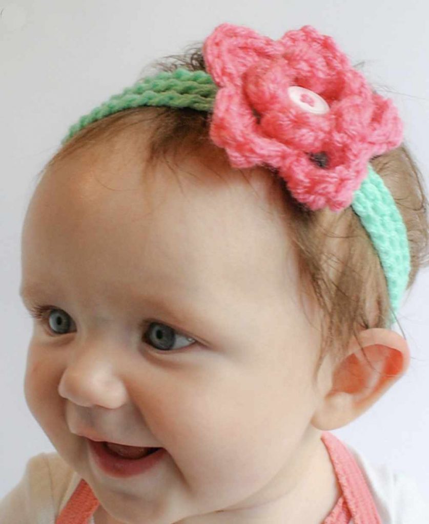 image of a baby with a flower headband