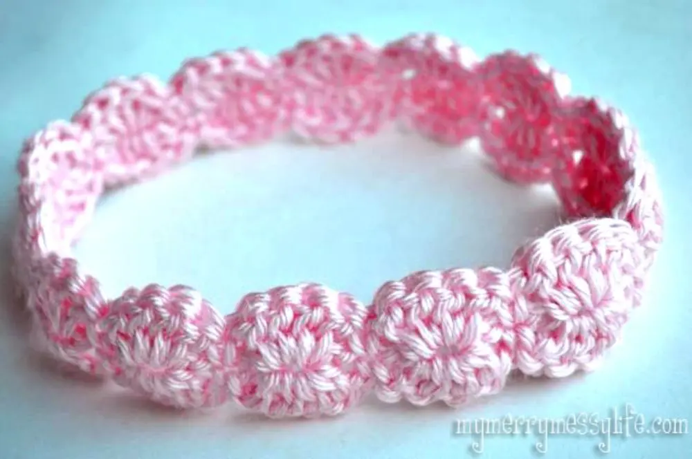 image of a pink crochet headband