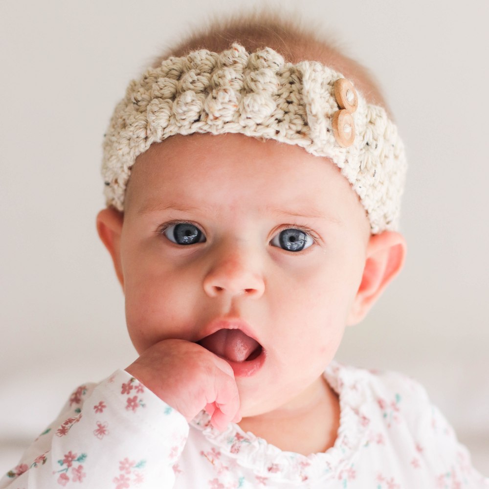 image of infant with crochet headband