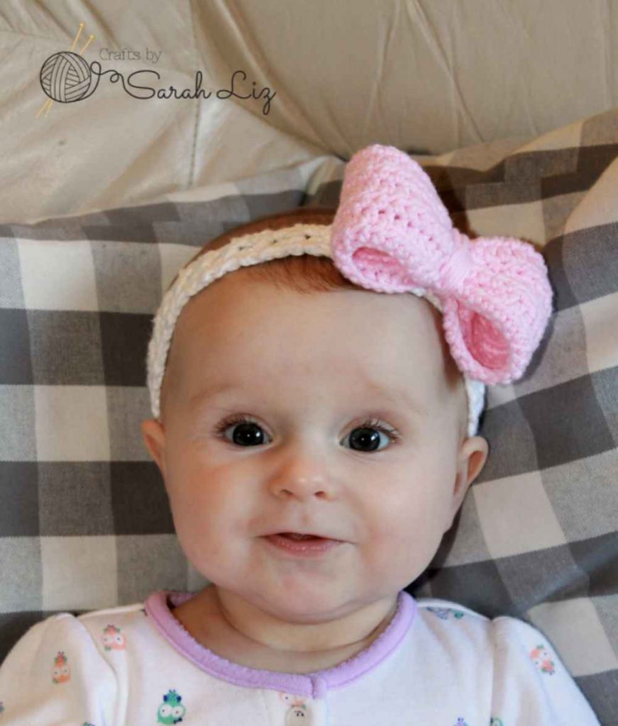 image of baby with crochet bow headband
