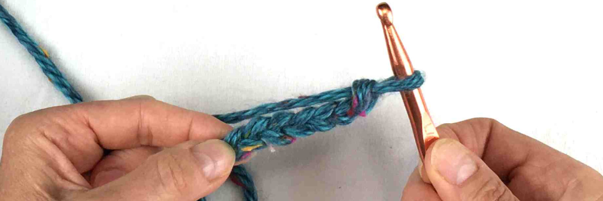 image of a crocheted chain with green yarn