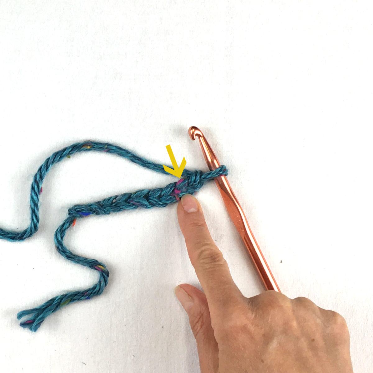 image of a crochet chain and hook