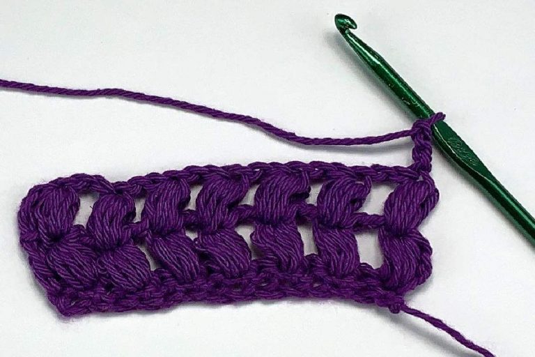 Two rows of crochet puff stitches with a hook