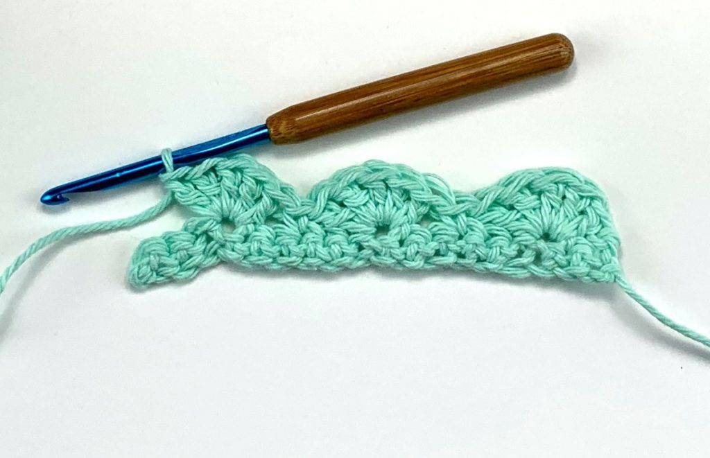 image of three crochet shell stitches