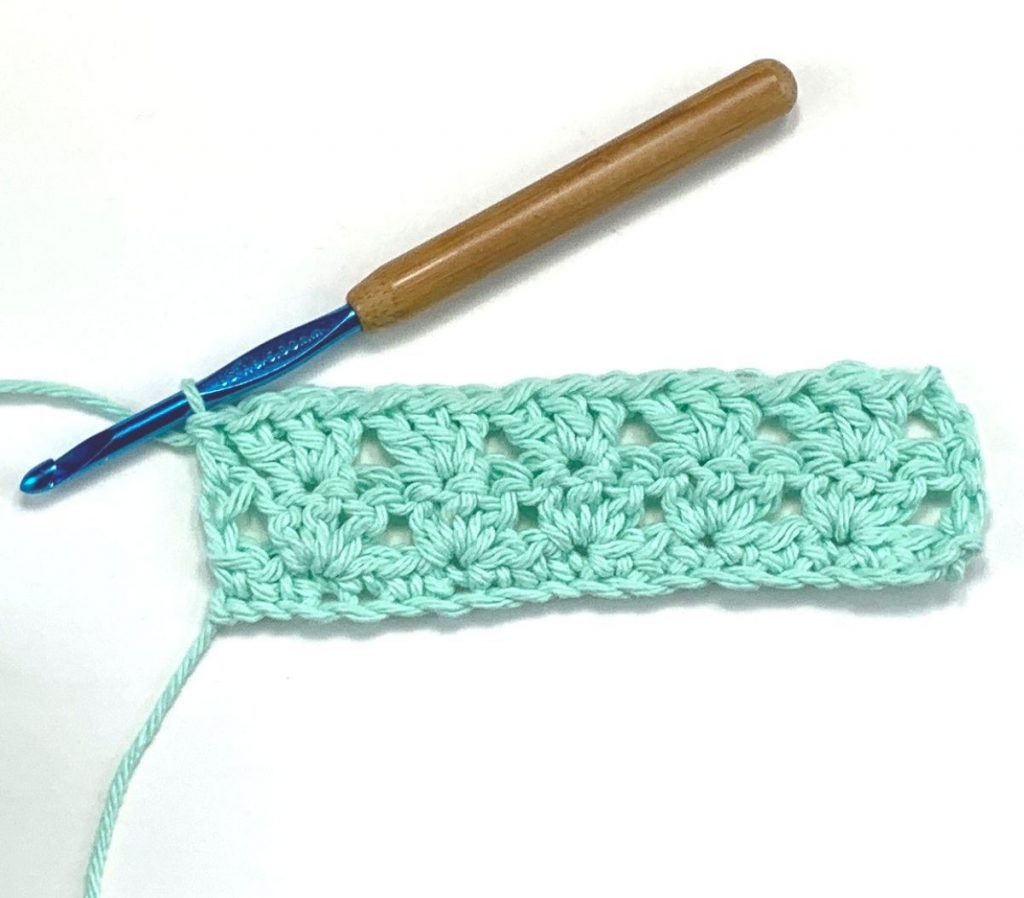 image of crochet in turquoise yarn