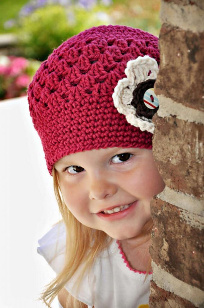 image of a little girl with a crocheted hat