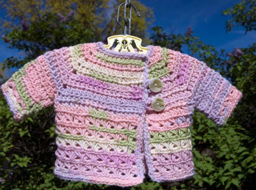 image of a pink and purple baby crochet jacket