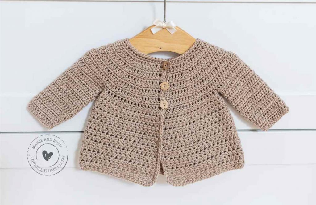 image of a brown baby jacket on a hanger